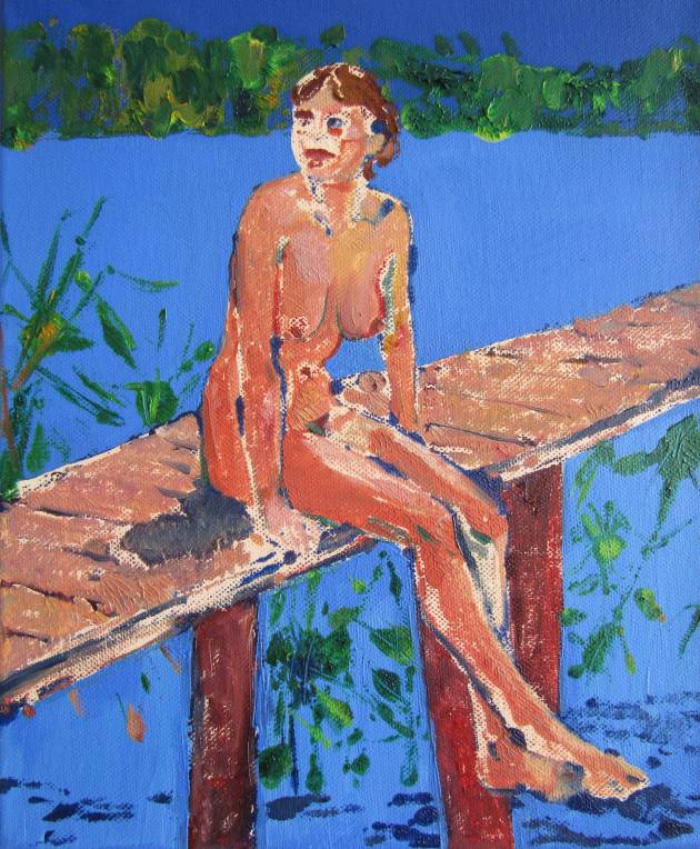 Girl sitting on a dock
